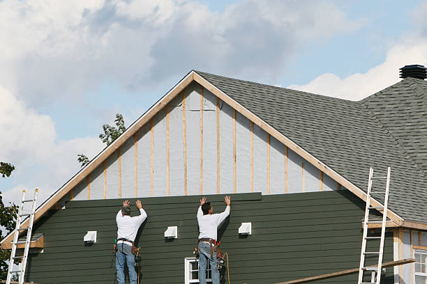 Professional Siding Contractor technician working in West Columbia, TX
